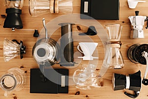 Kettle, scales, geyser, grinder, aeropress, pour over, glass flask top view. Alternative coffee brewing method set, flat lay.