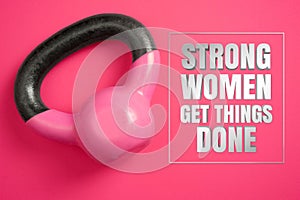 Kettle Weights on Pink Background with Inspirational Quote. Strong Women Get Things Done.