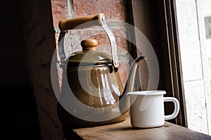 Kettle and white cup