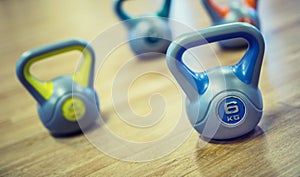 Kettlebel. kettlebell in gym on floor. Toned image