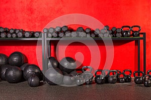 Kettlebell dumbbell and weighted balls at gym