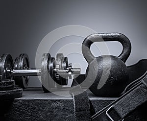 Kettlebell and sports dumbbells for training in the gym