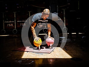 Kettlebell Trainer Performing Bottoms-up Push-ups