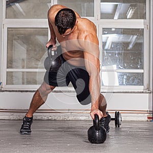 Kettlebells pull up crossfit training photo