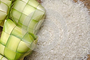 Ketupat casing and rice in bamboo container. traditional malay delicacy during Malaysian eid festival
