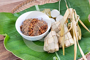 Ketupat, lemang, served with serunding, popular Malay delicacies during Hari Raya celebration