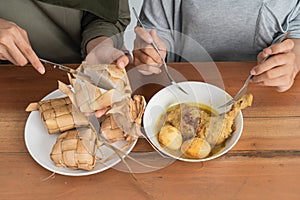 Ketupat and opor ayam for ramadan celebration photo