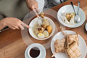 Ketupat and opor ayam for ramadan celebration photo