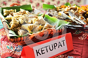 Ketupat palas, a Malay delicacy made from glutinous rice and coconut milk packed inside a diamond shaped container made of wooven