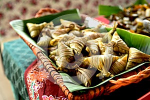 Ketupat palas, a Malay delicacy made from glutinous rice and coconut milk packed inside a diamond shaped container made of wooven