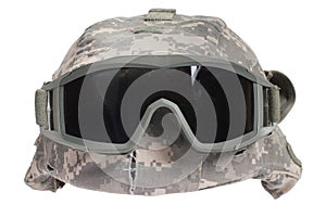 kevlar helmet with camouflage cover and protective goggles