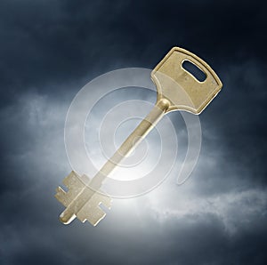 Key against dramatic sky