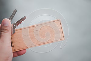 Key with empty wooden tag