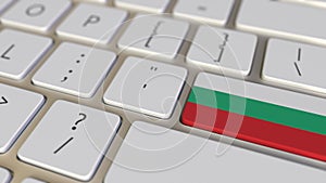 Key with flag of Bulgaria on the computer keyboard switches to key with flag of China, translation or relocation related