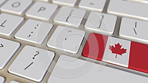 Key with flag of Canada on the computer keyboard switches to key with flag of China, translation or relocation related