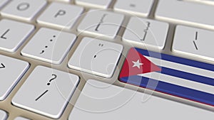 Key with flag of Cuba on the computer keyboard switches to key with flag of China, translation or relocation related