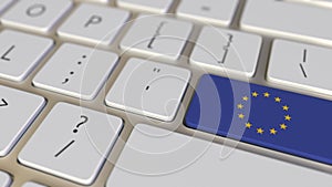 Key with flag of the European Union on the keyboard switches to key with flag of Germany, translation related animation