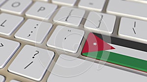 Key with flag of Jordan on the computer keyboard switches to key with flag of China, translation or relocation related