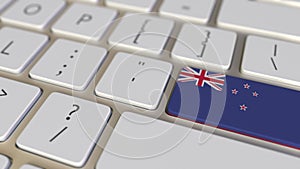 Key with flag of New Zealand on the computer keyboard switches to key with flag of China, translation or relocation
