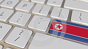 Key with flag of North Korea on the computer keyboard switches to key with flag of China, translation or relocation