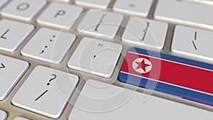 Key with flag of North Korea on the computer keyboard switches to key with flag of France, translation or relocation