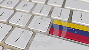 Key with flag of Venezuela on the keyboard switches to key with flag of Germany, translation or relocation related