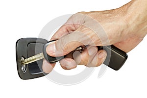 Key in hand is locking the door