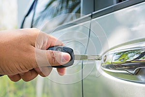 Key in hand is locking the door