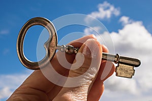 Key into hand, Sky Background