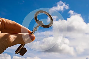 Key into hand, Sky Background