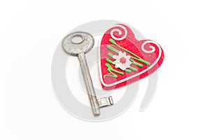 Key and heart isolated on white