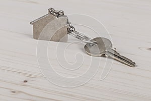 Key with home shaped keyring