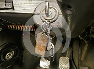 The key is in the ignition. Keys in the car lock. Ignition key in the car. A key is inserted into the lock. lock to