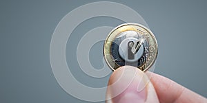 Key in Lock on a Euro Coin - Financial Concept