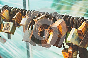 Key lock by lover couple at Noen Nangphaya View Point , Chanthaburi, Thailand, belief that prayer is complete, Concept Faith in a