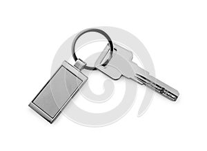 Key with metallic keychain isolated on white, top view