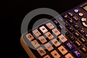 Key number four of the keyboard of a scientific calculator