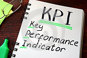 Key Performance Indicators KPI written on a notepad. photo