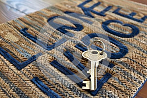 key on personalized doormat with welcome