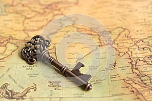 Key placed on the world map. Use as a concept solving the problem of each area