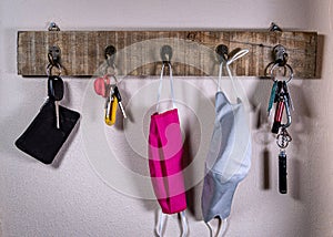 Key rack with keys and face masks
