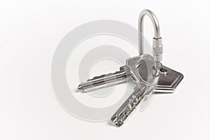 Key ring with keys over white background. Rent