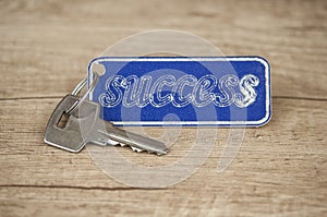 Key with a success tag