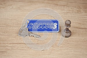 Key with a success tag