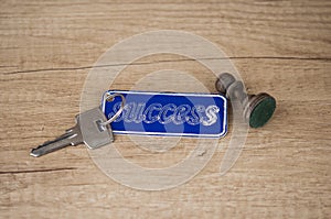 Key with a success tag