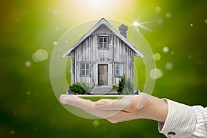 Key symbolizes attainment of dream home in real estate