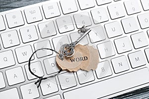 Key with tag WORD on computer keyboard, top view. Keyword concept