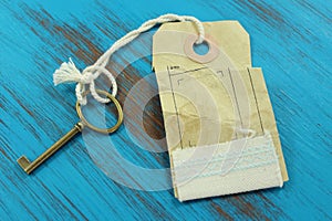 The key to success. Blue rustic wooden background.