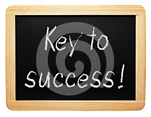 Key to success - handwritten text on chalkboard