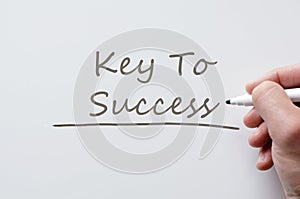Key to success written on whiteboard